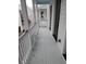 Exterior balcony with painted wood floor and white wood trim at 24 Iron Frg Aly, Charleston, SC 29403