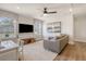Versatile bonus room with large windows, media center, and comfortable seating at 113 O'Leary Circle, Summerville, SC 29483