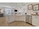 Bright kitchen features a large island with a farmhouse sink and stainless steel appliances at 113 O'Leary Circle, Summerville, SC 29483