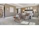 Spacious main bedroom with seating area, stylish furnishings, and abundant natural light at 113 O'Leary Circle, Summerville, SC 29483