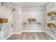 Spacious walk-in closet features wire shelving, hanging rods and room for ample storage at 113 O'Leary Circle, Summerville, SC 29483
