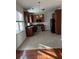 Kitchen with dark wood cabinets, tile floors, and stainless steel appliances at 170 Willowbend Ln, Summerville, SC 29485