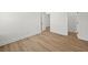 Bedroom featuring hard floors, a closet and neutral walls at 2833 Auldreeke Rd, Johns Island, SC 29455