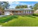 Charming single-story brick home with an attached garage and a well-maintained lawn at 125 Bramwell Dr, Summerville, SC 29485