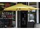 Accent on Wine bar with yellow umbrella at 102 Flud St, Summerville, SC 29483