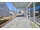Covered patio with concrete flooring and access to sliding glass doors at 321 Trailmore Ln, Summerville, SC 29486