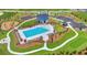 Aerial view of a community pool, playground, parking, and other outdoor amenities at 127 Grange Cir, Summerville, SC 29486