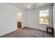 Bedroom featuring neutral carpet and direct bathroom access at 174 Education Blvd, Ladson, SC 29456
