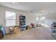 Spacious bonus room with carpet flooring and natural light from multiple windows at 174 Education Blvd, Ladson, SC 29456