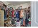 Organized walk-in closet with ample hanging space and storage shelves at 174 Education Blvd, Ladson, SC 29456