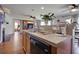 Well-lit kitchen boasts stainless steel sink, modern appliances, and sleek countertop with convenient breakfast bar area at 174 Education Blvd, Ladson, SC 29456