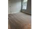 Well-lit bedroom with neutral walls and wall-to-wall carpeting at 746 Opal Wing St, Moncks Corner, SC 29461