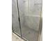 Modern shower with marble tile and gray hexagonal floor tile at 746 Opal Wing St, Moncks Corner, SC 29461