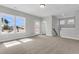 Large bonus room featuring lots of natural light and neutral carpeting at 357 Wappoo Trace Ln, Summerville, SC 29486