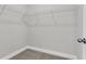Walk-in closet with carpet and wire shelving for storage at 357 Wappoo Trace Ln, Summerville, SC 29486