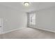 This bedroom features neutral walls, carpeted flooring, and a window at 176 Cantona Dr, Summerville, SC 29483
