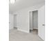 Neutral bedroom featuring neutral carpet, white walls, and a walk-in closet at 123 Cantona Dr, Summerville, SC 29483
