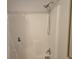 Bright white shower with updated fixture with convenient soap shelf, ready for relaxation at 122 Greyson Cir, Goose Creek, SC 29445