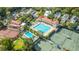 Aerial view of community pool, tennis courts and amenities surrounded by lush trees and landscaping at 55 Rialto Rd, Mount Pleasant, SC 29464