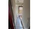 Small bathroom with pink tub and tile flooring at 2 Ducs Ct, Charleston, SC 29403