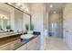 Bathroom features a granite double vanity and walk in shower at 169 Cooper River Dr, Mount Pleasant, SC 29464