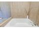 Relaxing bathroom with soaking tub and tiled walls at 169 Cooper River Dr, Mount Pleasant, SC 29464