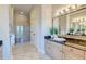 Elegant bathroom with double vanity, large mirror, and walk-in shower at 169 Cooper River Dr, Mount Pleasant, SC 29464