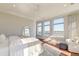Spacious bedroom with large windows offering scenic views and hardwood floors at 169 Cooper River Dr, Mount Pleasant, SC 29464