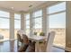 Elegant dining area with large windows and water views at 169 Cooper River Dr, Mount Pleasant, SC 29464