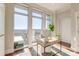 Sunlit home office boasts large windows and hardwood floors at 169 Cooper River Dr, Mount Pleasant, SC 29464
