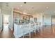 Open concept kitchen with island and views into living room at 169 Cooper River Dr, Mount Pleasant, SC 29464