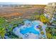 Resort-style pool with plenty of lounge chairs and a covered bar area at 169 Cooper River Dr, Mount Pleasant, SC 29464