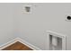 The laundry area has hookups for a washer and dryer with hardwood-style flooring at 6261 Gritman Dr, Hollywood, SC 29470