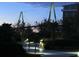 Night view of community pool area with bridge in background at 221 S Plaza Ct # 107, Mount Pleasant, SC 29464