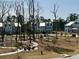 Overhead shot of homes surrounding a common greenspace featuring walkways, fire pit, and seating at 3105 Sturbridge Rd, Mount Pleasant, SC 29466