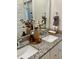 Close-up of a beautifully appointed bathroom vanity with granite countertop, showcasing elegant fixtures and decorative accessories at 3105 Sturbridge Rd, Mount Pleasant, SC 29466
