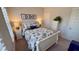 Comfortable bedroom featuring nautical-themed decor, including seashell art, creating a calming and inviting atmosphere at 3105 Sturbridge Rd, Mount Pleasant, SC 29466