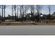 A community park with bare trees, walking paths, and benches offers a serene escape for residents at 3105 Sturbridge Rd, Mount Pleasant, SC 29466