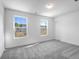 Bedroom features natural light, carpet flooring, and white trim throughout the home at 185 Surf Bird Rd # 506P, Summerville, SC 29486