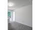 Room with light gray carpet, white walls, and white trim throughout the home at 185 Surf Bird Rd # 506P, Summerville, SC 29486