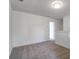 Neutral room with light gray carpet, white walls, and white trim throughout the home at 185 Surf Bird Rd # 506P, Summerville, SC 29486