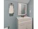 Bathroom view with a white vanity, mirror, towel rack, and modern sink at 118 Carter, Walterboro, SC 29488