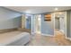 Bedroom featuring a bed, carpet flooring, and an open door leading to a bathroom at 118 Carter, Walterboro, SC 29488