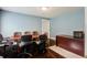 Office featuring a large table, office chairs, dark hardwood floors, and light blue walls at 118 Carter, Walterboro, SC 29488