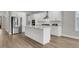 Large kitchen featuring white cabinets, stainless steel appliances, and a center island with a sink at 709 Maynard Ln, Summerville, SC 29486
