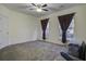 Spacious bedroom with ceiling fan and carpet at 115 Golfview Ln, Summerville, SC 29485