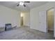 Bright bedroom with ceiling fan and carpet at 115 Golfview Ln, Summerville, SC 29485