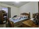 Bedroom with wooden bed frame and window at 115 Golfview Ln, Summerville, SC 29485