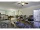 Open living room with kitchen view and hardwood floors at 115 Golfview Ln, Summerville, SC 29485