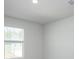 Bright room features a window bringing natural light into the clean and neutral living space at 204 West Bradford Pointe Dr, Summerville, SC 29486